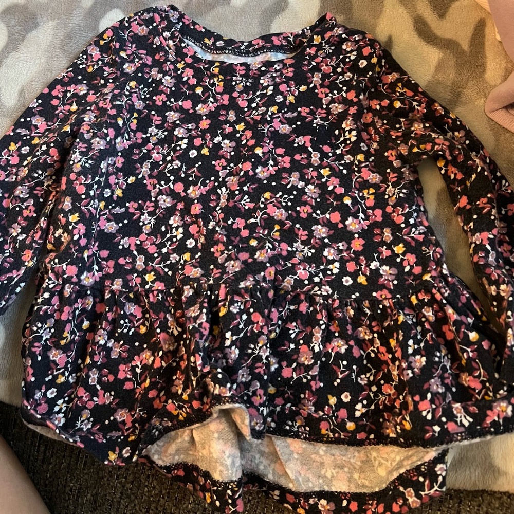 various baby clothes ranging from 12-18 months
